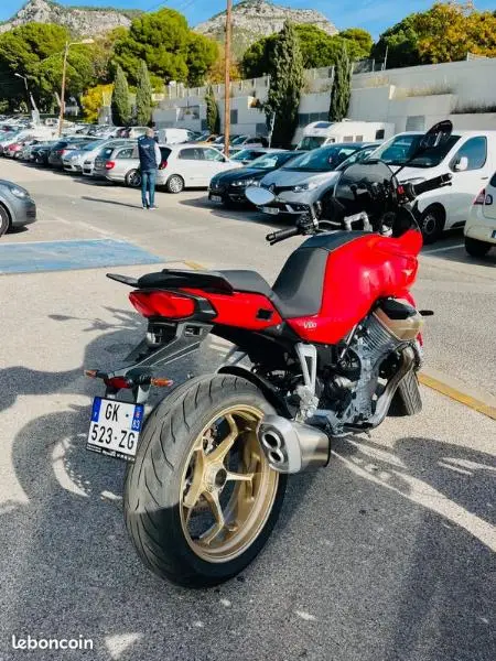 V100  MANDELLO