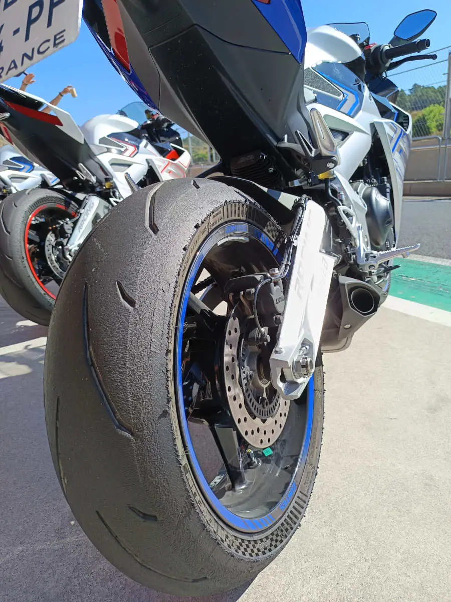 Zoom in on the bike's rear tire after a track session
