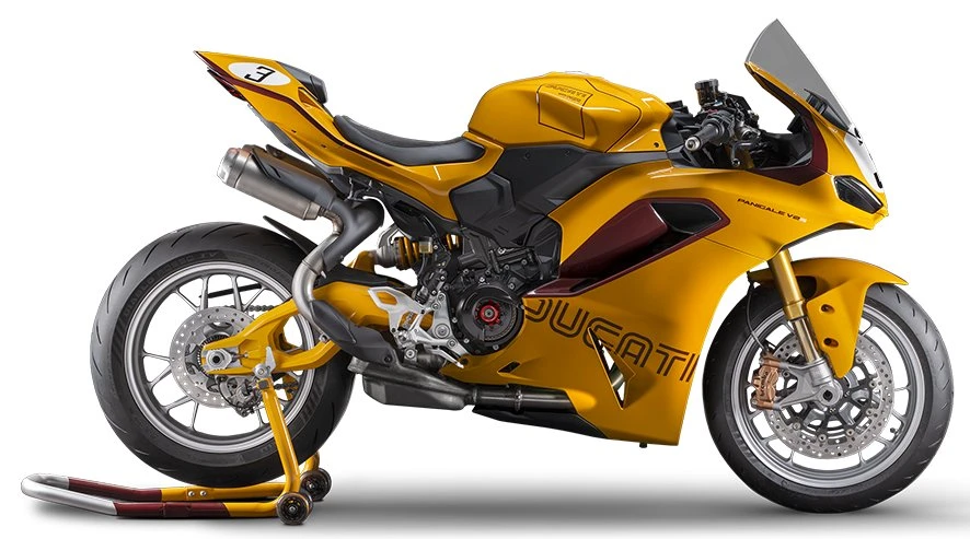 Une moto Ducati Panigale V2 S Collezione 100 jaune avec sa béquille d'atelier