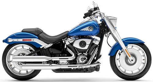 Foto de perfil del 1920 Softail Fat Boy FLFB 2025 en color azul.