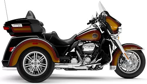 Foto de perfil del 1870 Tri Glide Ultra FLHTCUTG 2024 en color amarillo / negro.