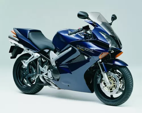 Foto de perfil del VFR 800 V-TEC  RC 46 II 2002 en color azul.