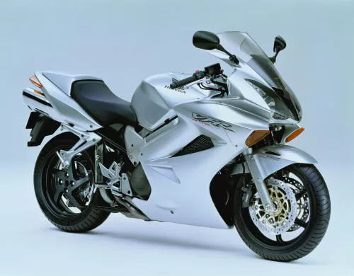 Foto de perfil del VFR 800 V-TEC  RC 46 II 2003 en color indefinido.