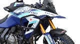 The front end of a blue and white Suzuki V-Strom 800DE motorcycle