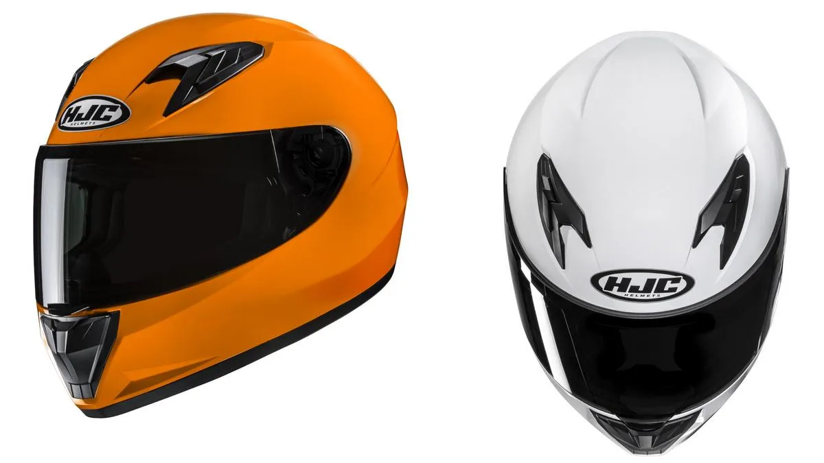 Dos cascos HJC Y10 naranjas y blancos